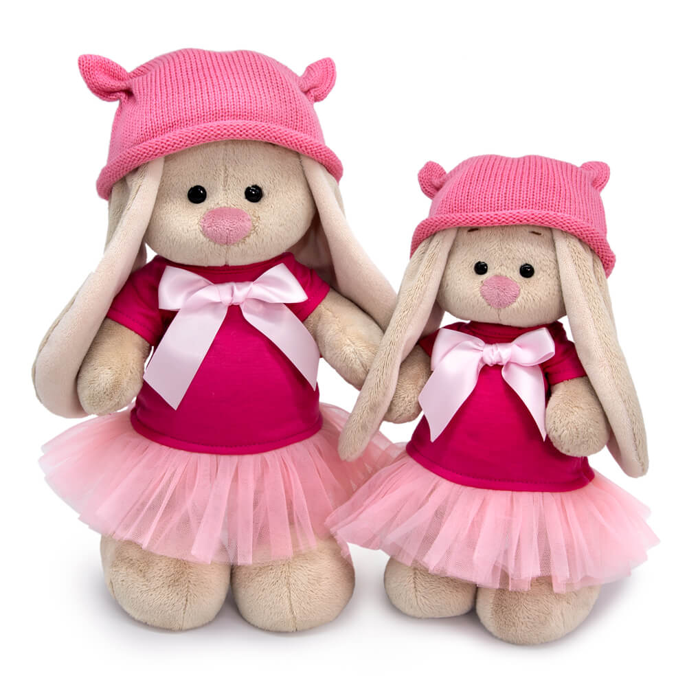 in a dress and cap with ears