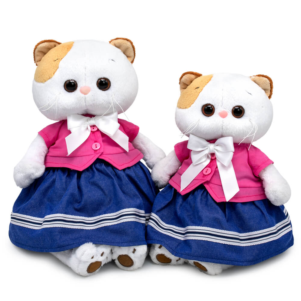 in a jacket with a bow and a skirt