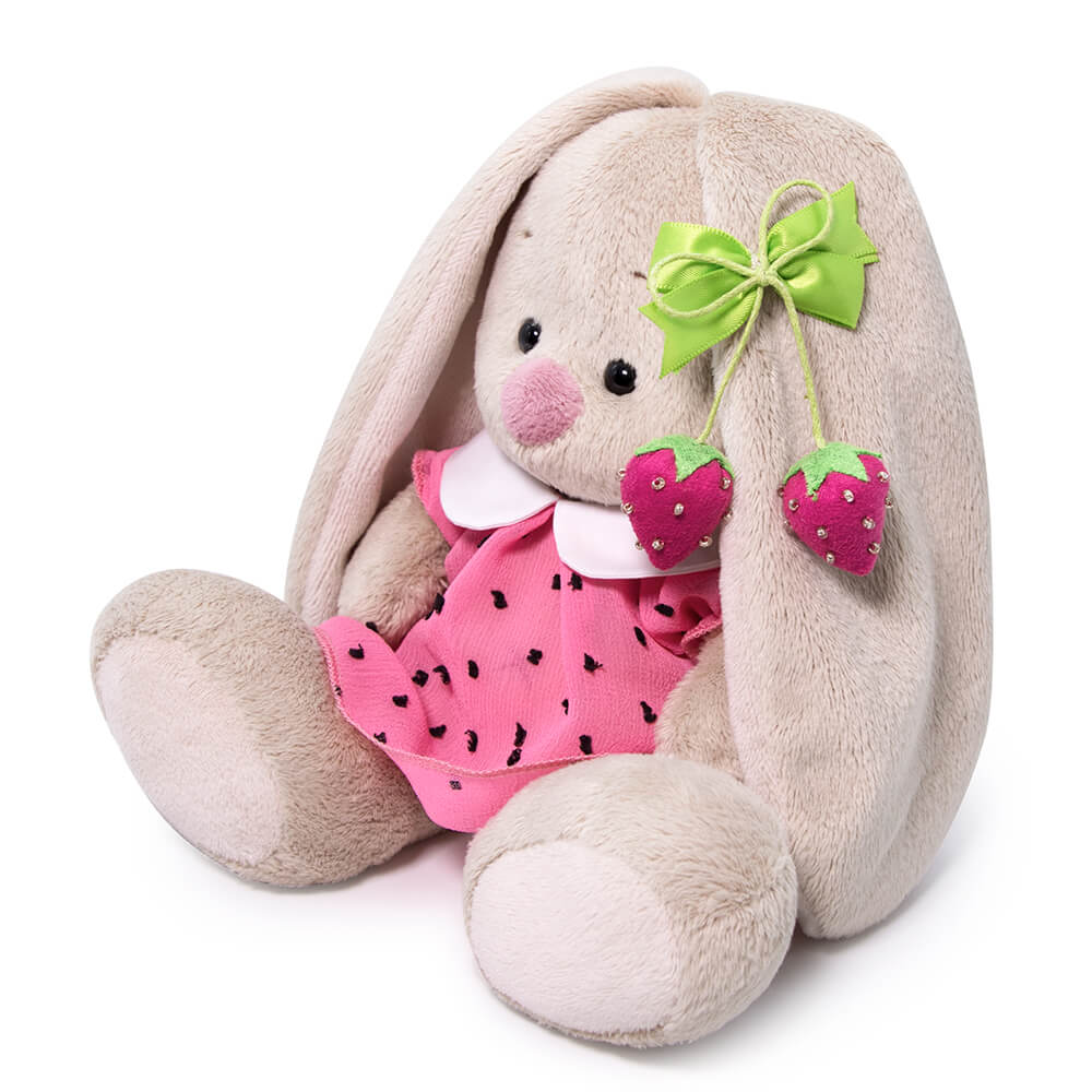 in a pink dress with strawberry