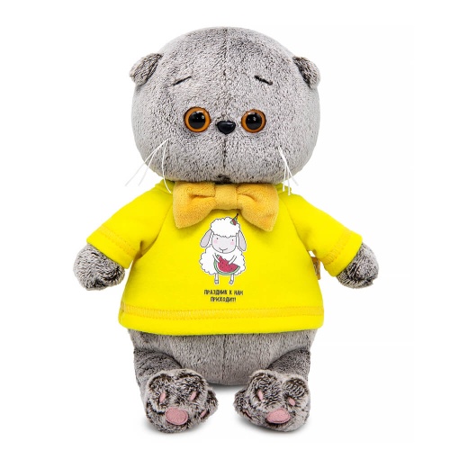 Baby Basik in a long‑sleeve top with a sheep