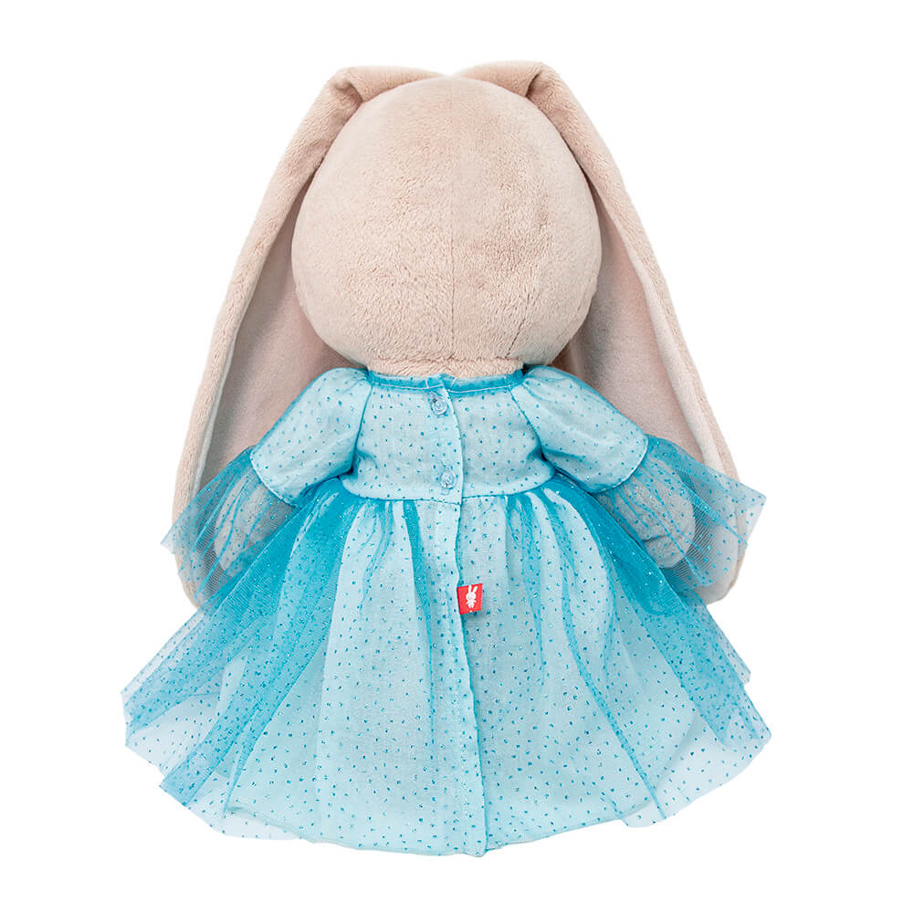 big in a dress with a brooch