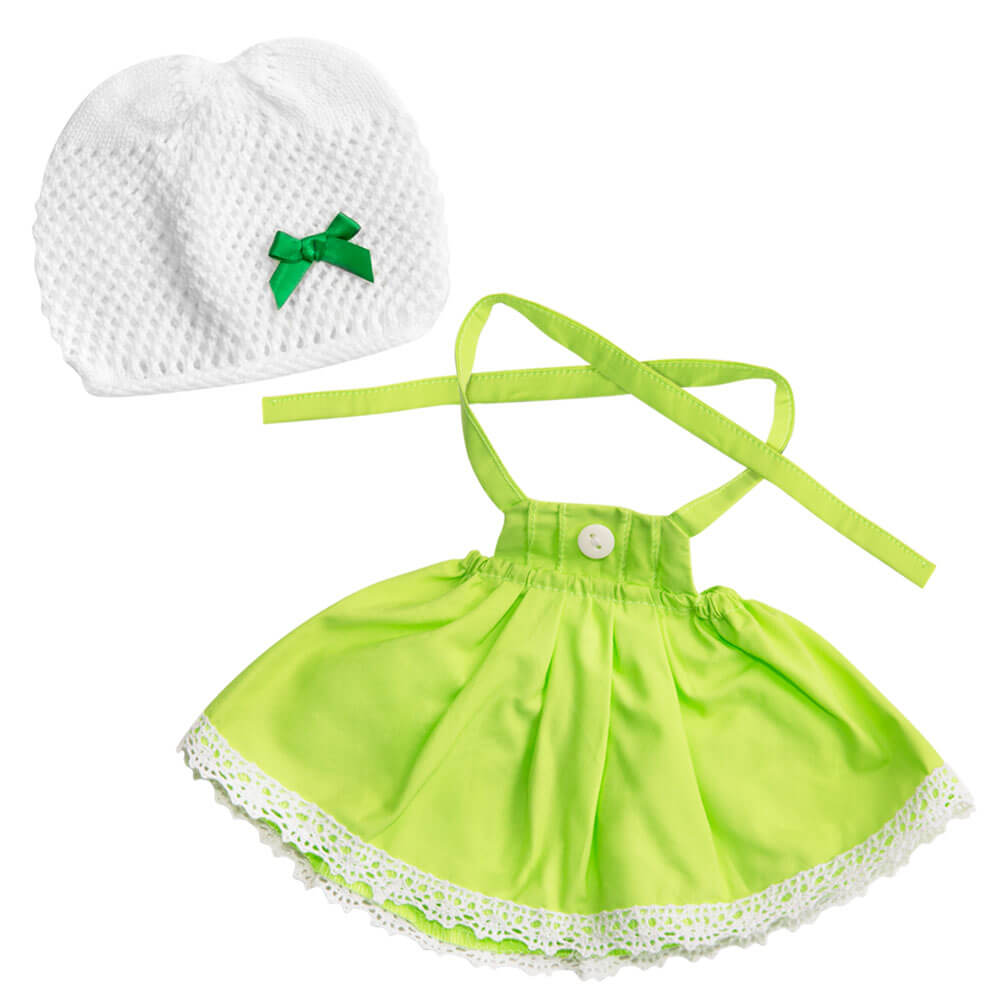 Light green dress and white hat