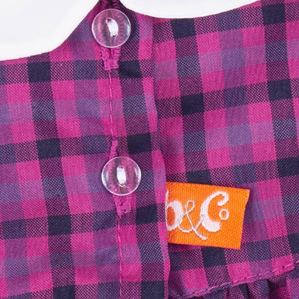 Checkered dress with pink bow