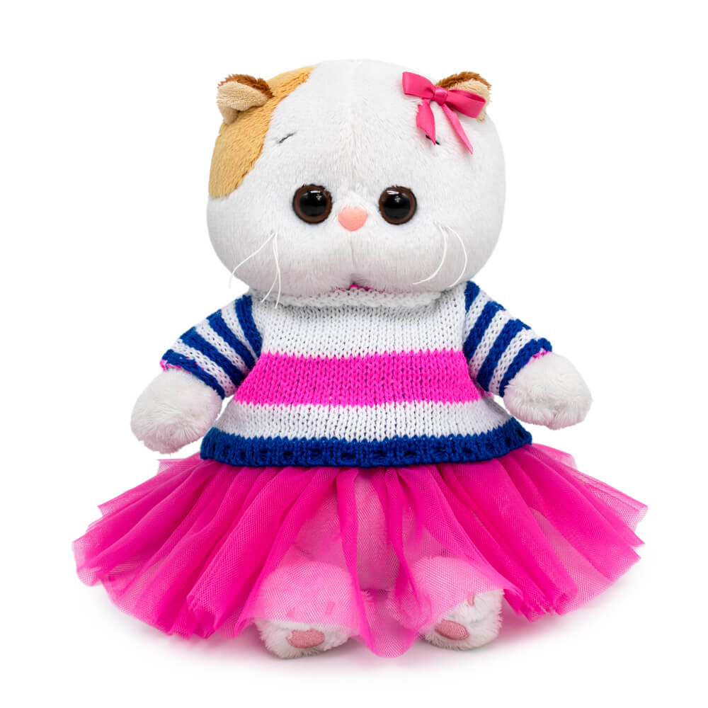 in a striped sweater and skirt