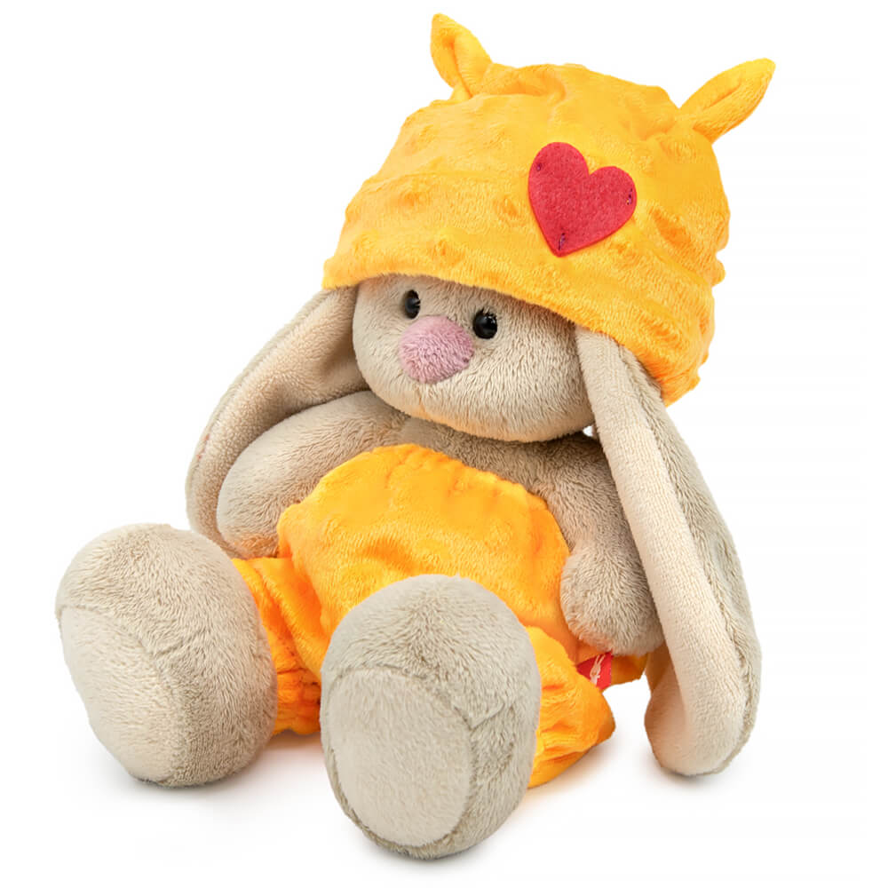 in a hat with a heart and pants
