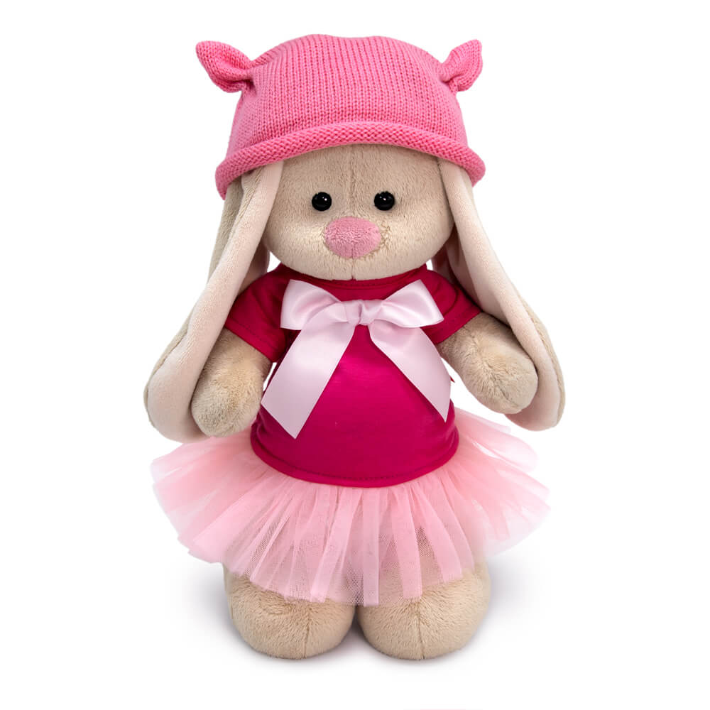 in a dress and cap with ears