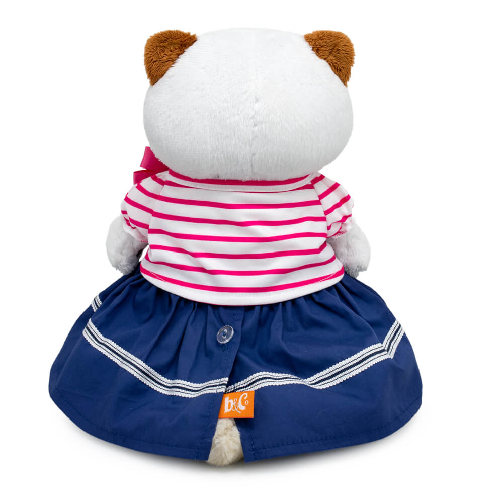 in a striped T-shirt and skirt