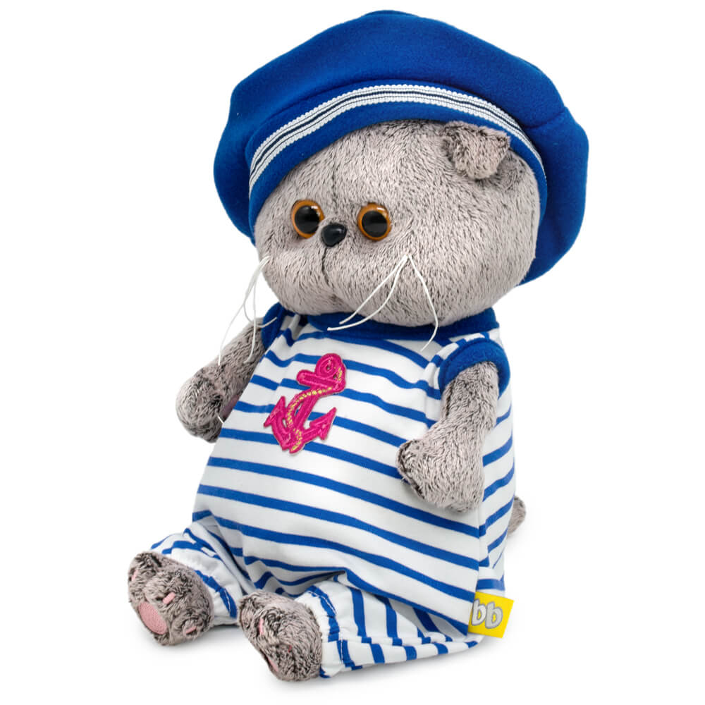 in striped overalls and a beret