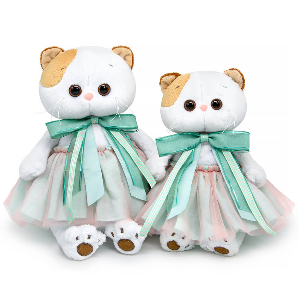 in a skirt and with a mint bow