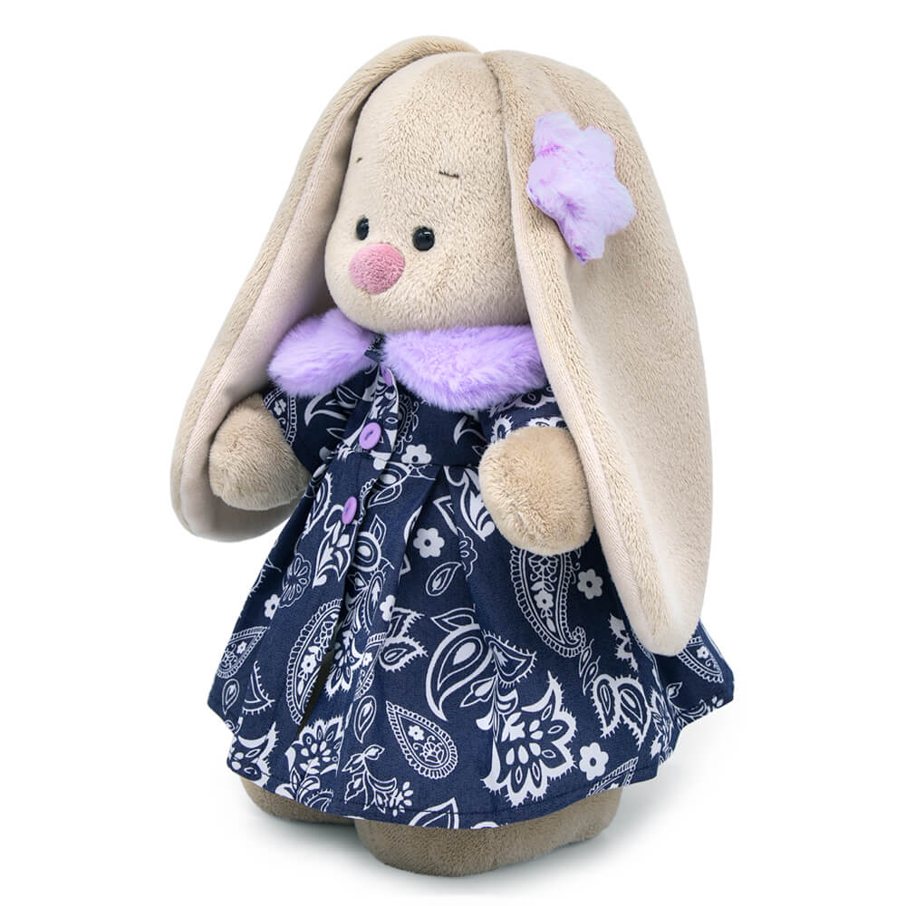 in a coat with lilac collar