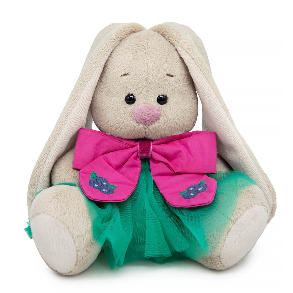 in a lush skirt and a bow