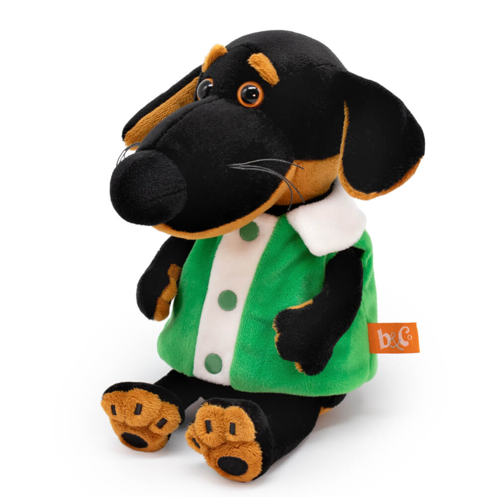 in a vest with a white collar