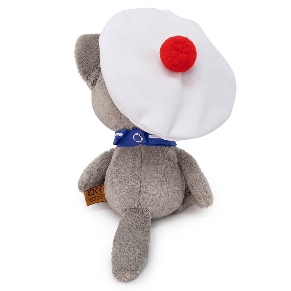 Wolf cub Voka in a marine collar and beret
