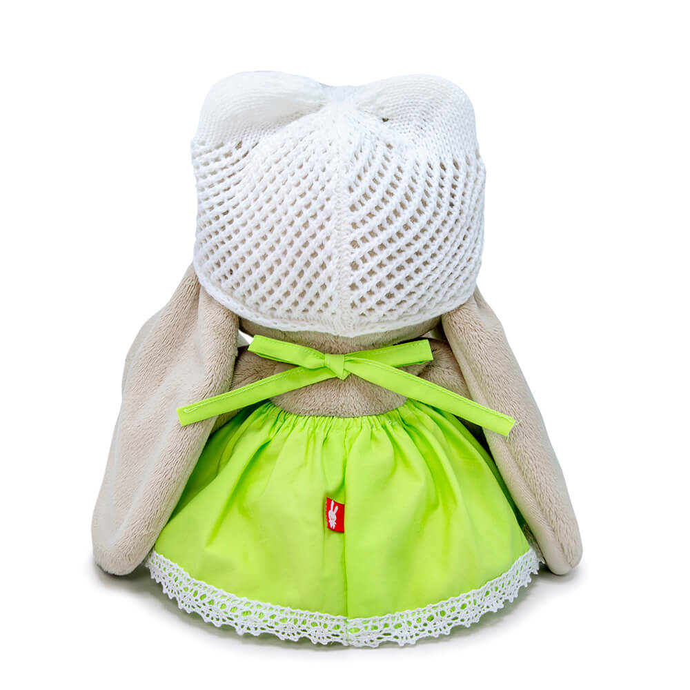 in a light green dress with lace