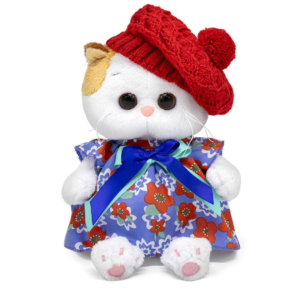 in a dress and an openwork beret