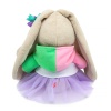 Zaika Mi in a sweatshirt and skirt