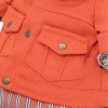 in orange jacket and pants