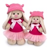 in a dress and cap with ears