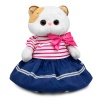 in a striped T-shirt and skirt