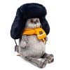in a fur hat and scarf