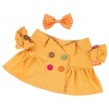 Orange raincoat and multi-colored polka dot dress