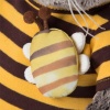 in a striped t-shirt with a bee