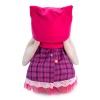in a dress with snood and hat