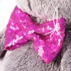 in a bow tie in sequins