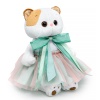 in a skirt and with a mint bow
