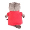 in a red fleece vest