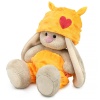 in a hat with a heart and pants