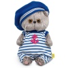 in striped overalls and a beret