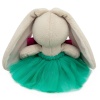 in a lush skirt and a bow