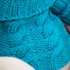 in blue sweater
