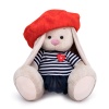 in vest and beret