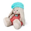 in a knitted beret
