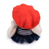 in vest and beret