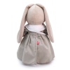in dress and with an owl bag