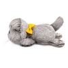 Basik cat with a bow reclining on Velcro