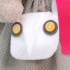 in dress and with an owl bag