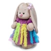 in a dress with frills