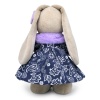 in a coat with lilac collar