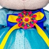 big in a dress with a brooch