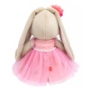 Zaika Mi in a pink dress