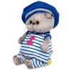 in striped overalls and a beret