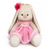 Zaika Mi in a pink dress