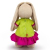 in a dress with bows