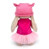 in a dress and cap with ears