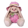 in a hat and with a bear