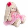 Zaika Mi in a pink dress